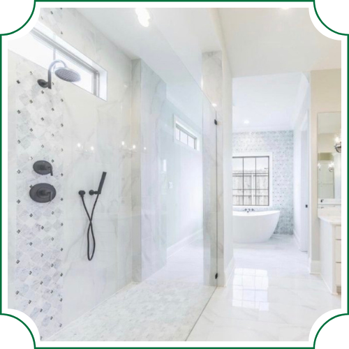 white bathroom with frameless shower door and bathtub