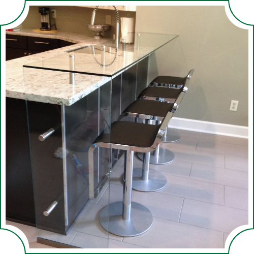 specialty glass countertop with barstools