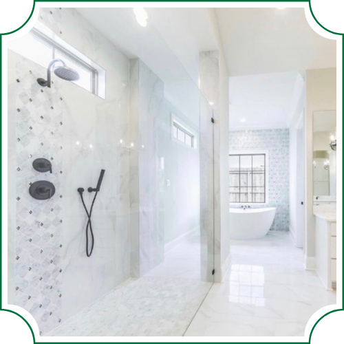 white bathroom with frameless shower door and bathtub